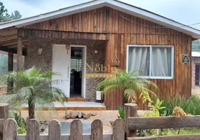 Foto 1 de Casa com 2 Quartos à venda, 84m² em Itapeva, Torres