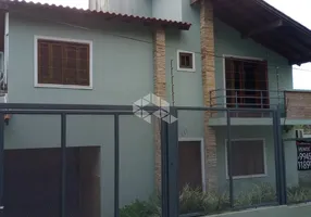 Foto 1 de Casa de Condomínio com 3 Quartos à venda, 119m² em Camaquã, Porto Alegre