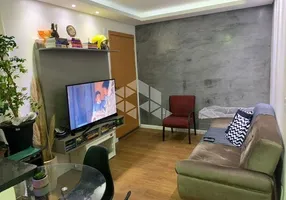 Foto 1 de Apartamento com 2 Quartos à venda, 40m² em Vila Nova, Porto Alegre