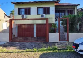 Foto 1 de Casa com 4 Quartos à venda, 197m² em Partenon, Porto Alegre