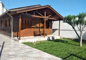 Foto 1 de Casa com 4 Quartos à venda, 325m² em Vila Nova, Porto Alegre
