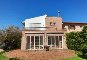 Foto 1 de Casa de Condomínio com 4 Quartos à venda, 276m² em Cantegril, Viamão