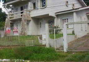 Foto 1 de Sobrado com 6 Quartos à venda, 280m² em Tarumã, Viamão