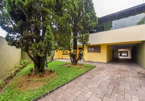 Foto 1 de Sobrado com 5 Quartos à venda, 385m² em Ahú, Curitiba