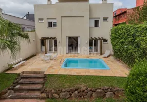 Foto 1 de Casa com 5 Quartos à venda, 380m² em Chácara das Pedras, Porto Alegre