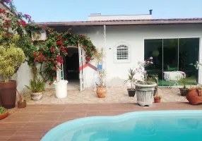 Foto 1 de Casa com 4 Quartos à venda, 209m² em Pontal de Santa Marina, Caraguatatuba