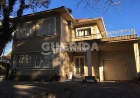 Foto 1 de Casa com 5 Quartos à venda, 330m² em Petrópolis, Porto Alegre