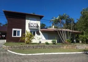 Foto 1 de Casa de Condomínio com 6 Quartos à venda, 542m² em Cacupé, Florianópolis