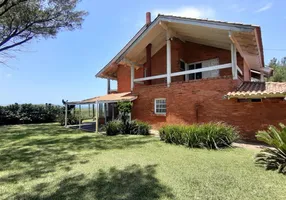 Foto 1 de Sobrado com 4 Quartos à venda, 300m² em Zona Nova, Capão da Canoa