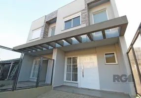 Foto 1 de Casa com 3 Quartos à venda, 127m² em Guarujá, Porto Alegre