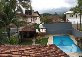 Foto 1 de Casa de Condomínio com 3 Quartos à venda, 220m² em Balneário Praia do Pernambuco, Guarujá