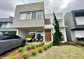 Foto 1 de Casa de Condomínio com 4 Quartos à venda, 210m² em Xangri la, Xangri-lá