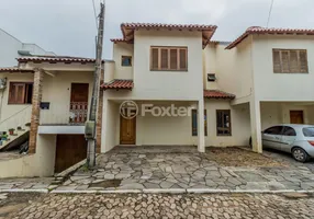 Foto 1 de Casa de Condomínio com 3 Quartos à venda, 90m² em Campo Novo, Porto Alegre