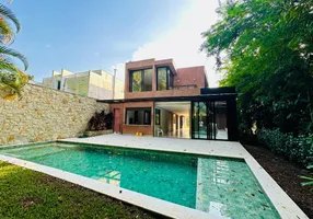 Foto 1 de Casa com 5 Quartos à venda, 437m² em Riviera de São Lourenço, Bertioga