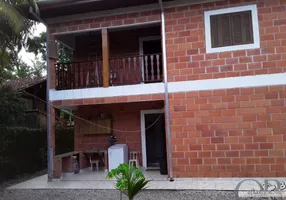 Foto 1 de Sobrado com 4 Quartos à venda, 220m² em Ressaca, Ubatuba