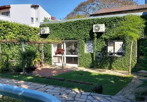 Foto 1 de Casa com 4 Quartos à venda, 250m² em Jardim Botânico, Porto Alegre