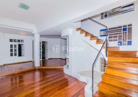 Foto 1 de Sobrado com 4 Quartos à venda, 190m² em Espiríto Santo, Porto Alegre