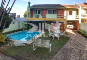 Foto 1 de Casa com 4 Quartos à venda, 250m² em Boa Vista, Porto Alegre