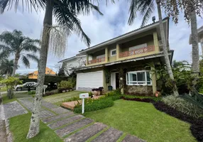 Foto 1 de Casa com 3 Quartos à venda, 242m² em Jurerê Internacional, Florianópolis