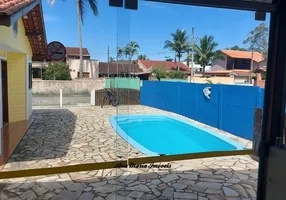 Foto 1 de Casa de Condomínio com 4 Quartos à venda, 174m² em Massaguaçu, Caraguatatuba