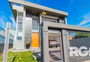 Foto 1 de Casa com 4 Quartos à venda, 239m² em Marechal Rondon, Canoas