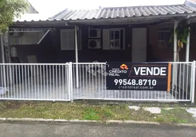 Foto 1 de Casa de Condomínio com 3 Quartos à venda, 70m² em Bela Vista, Alvorada