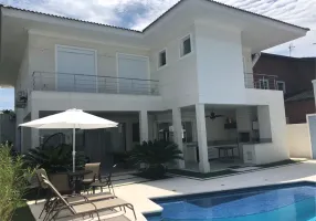 Foto 1 de Sobrado com 5 Quartos à venda, 460m² em Jardim Acapulco , Guarujá