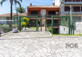 Foto 1 de Casa com 6 Quartos à venda, 572m² em Cavalhada, Porto Alegre