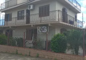 Foto 1 de Casa com 3 Quartos à venda, 201m² em Vila Nova, Porto Alegre