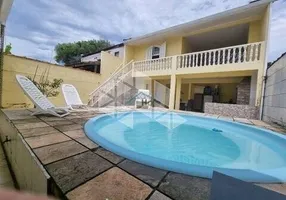 Foto 1 de Casa com 4 Quartos à venda, 204m² em Albatroz, Matinhos