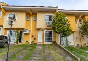 Foto 1 de Casa de Condomínio com 2 Quartos à venda, 104m² em Alto Petrópolis, Porto Alegre