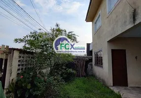 Foto 1 de Sobrado com 3 Quartos à venda, 150m² em Jardim Umuarama, Itanhaém
