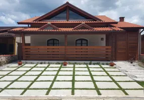 Foto 1 de Casa de Condomínio com 4 Quartos à venda, 187m² em Horto Florestal, Ubatuba