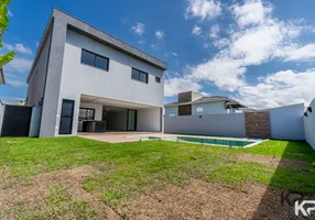Foto 1 de Casa de Condomínio com 4 Quartos à venda, 333m² em Boulevard Lagoa, Serra