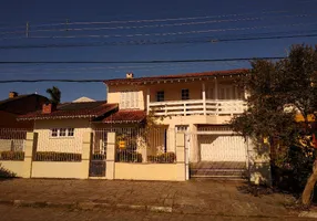 Foto 1 de Casa com 4 Quartos à venda, 264m² em Vila Nova, Porto Alegre