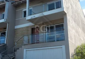 Foto 1 de Sobrado com 3 Quartos à venda, 202m² em Aberta dos Morros, Porto Alegre