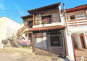 Foto 1 de Casa com 5 Quartos à venda, 244m² em Jardim Itú Sabará, Porto Alegre