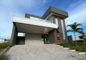 Foto 1 de Casa com 4 Quartos à venda, 261m² em Cidade Alpha, Eusébio