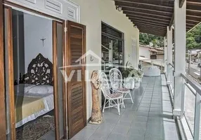 Foto 1 de Casa com 4 Quartos à venda, 445m² em Jardim California, Caraguatatuba