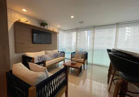 Foto 1 de Apartamento com 3 Quartos à venda, 102m² em Praia das Pitangueiras, Guarujá