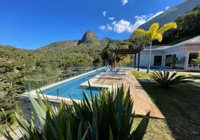 Foto 1 de Casa de Condomínio com 5 Quartos à venda, 1200m² em Araras, Petrópolis