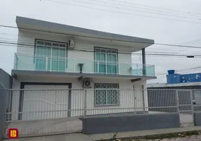 Foto 1 de Casa com 5 Quartos à venda, 229m² em Kobrasol, São José