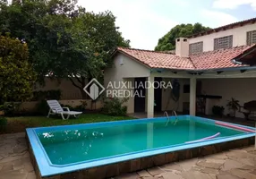 Foto 1 de Casa com 3 Quartos à venda, 249m² em Partenon, Porto Alegre