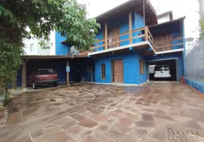 Foto 1 de Casa com 4 Quartos à venda, 258m² em Vila Nova, Novo Hamburgo