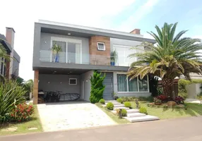 Foto 1 de Casa de Condomínio com 5 Quartos para alugar, 180m² em Xangri la, Xangri-lá