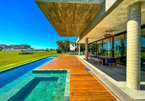 Foto 1 de Casa de Condomínio com 4 Quartos à venda, 542m² em Condominio Ocean Side, Torres
