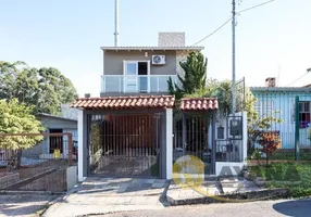 Foto 1 de Casa com 4 Quartos à venda, 170m² em Vila Nova, Porto Alegre