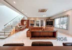 Foto 1 de Casa de Condomínio com 3 Quartos à venda, 219m² em Hípica, Porto Alegre