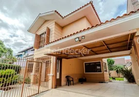 Foto 1 de Casa com 4 Quartos à venda, 250m² em Santa Fé, Porto Alegre