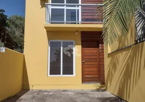 Foto 1 de Sobrado com 3 Quartos à venda, 100m² em Viamópolis, Viamão